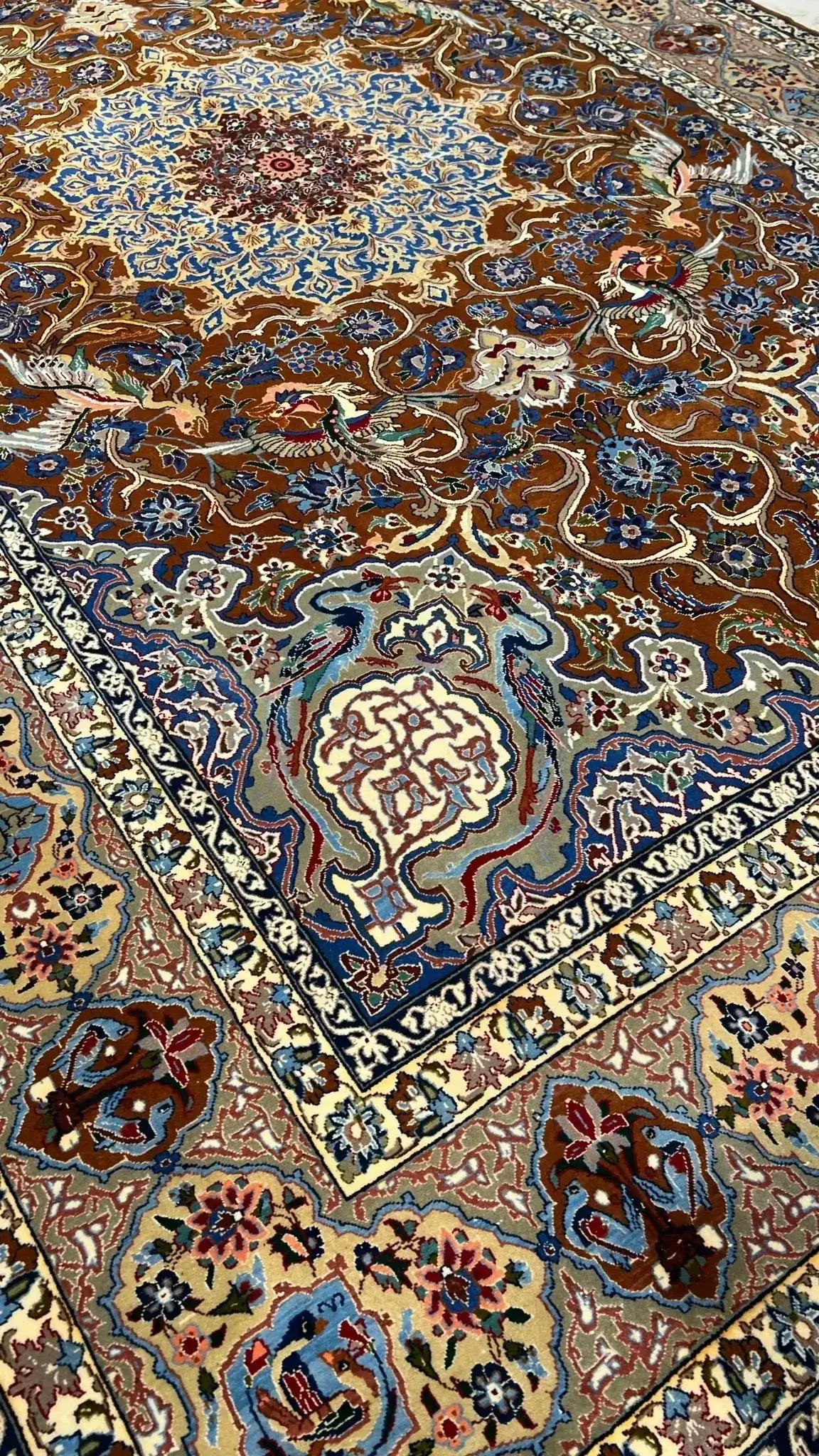 "Vintage Persian rug handwoven by Bahram Entesharie in Isfahan. Featuring a silk warp and wool pile, this 50-year-old carpet measures 255 cm x 149 cm with a knot density of 1,000,000 knots per square meter."